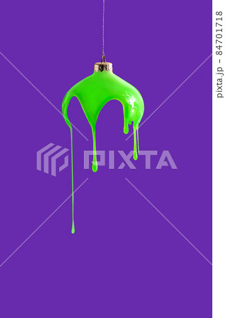 Neon paint is pouring from the New Year's ball. Neon paint is pouring from the New Year's ball. 84701718