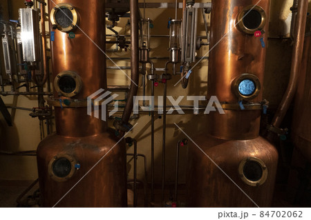 Copper alambic inside distillery Copper alambic inside distillery 84702062