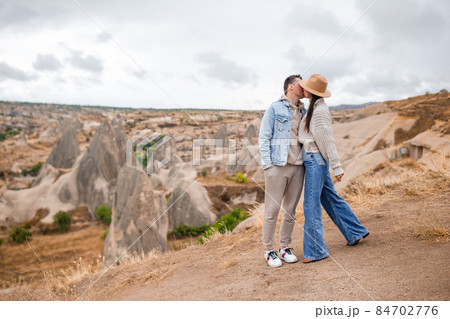 Happy couple on summer vacation in famous place. Cave formations. Happy couple on summer vacation in famous place. Cave formations. 84702776