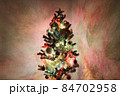 自宅用のクリスマスツリー冬のキラキラライトアップイルミネーション壁紙背景写真素材 84702958