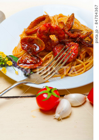 Italian seafood spaghetti pasta on red tomato sauce Italian seafood spaghetti pasta on red tomato sauce 84704367