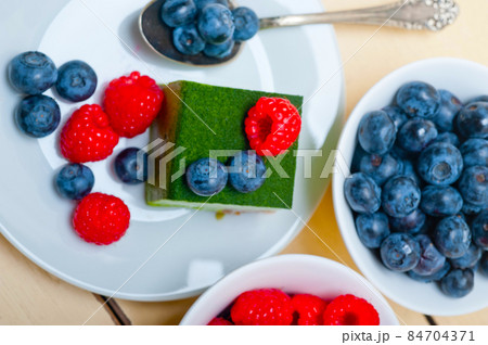 green tea matcha mousse cake with berries green tea matcha mousse cake with berries 84704371