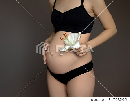 Beautiful pregnant young woman in clothes for Beautiful pregnant young woman in clothes for 84708296