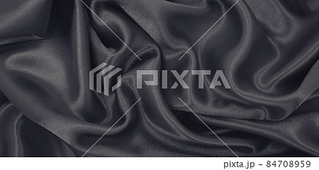 Smooth elegant brown silk or satin luxury cloth texture as abstract background. Luxurious background design wallpaper. In Sepia toned. Retro style Smooth elegant brown silk or satin luxury cloth texture as abstract background. Luxurious background design wallpaper. In Sepia toned. Retro style 84708959