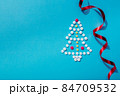 Creative Christmas tree made of pills, holiday greeting card with space for text 84709532