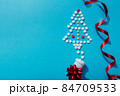 Creative Christmas tree made of pills, holiday greeting card with space for text 84709533