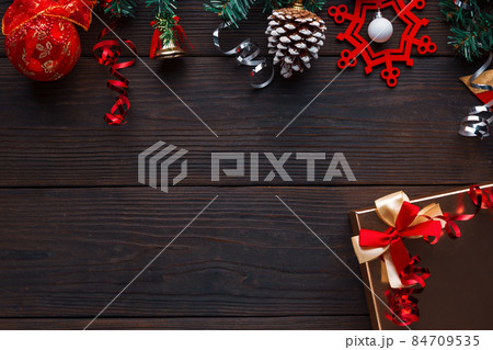 Christmas decorations with gift box and copy space for text, ideas for presents on holiday. 84709535