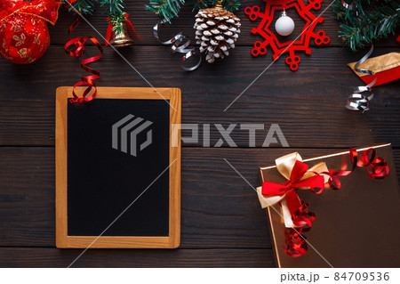 Christmas decorations with gift box and copy space for text, ideas for presents on holiday. 84709536