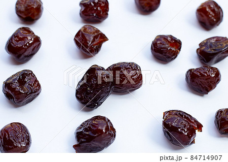 Sweet chinese jujube dessert on white background. Sweet chinese jujube dessert on white background. 84714907