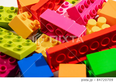 multi-colored blocks of children's designer. details of a educational game. multi-colored blocks of children's designer. details of a educational game. 84720709