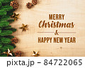 Christmas ball and pine tree with xmas decoration on wooden back 84722065