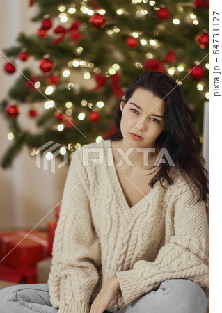 Bad Christmas - Hangover and Sleepy Feelings Woman After Winter Holidays Indoors at Home 84731127