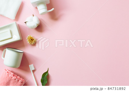 Various spa shower bath accessory bodycare products on pink background. flat lay, top view, copy space Various spa shower bath accessory bodycare products on pink background. flat lay, top view, copy space 84731892