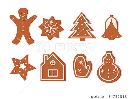 A set of Christmas gingerbread cookies of different shapes. Delicious New Year's dessert, festive curly cookies with icing A set of Christmas gingerbread cookies of different shapes. Delicious New Year's dessert, festive curly cookies with icing 84732018