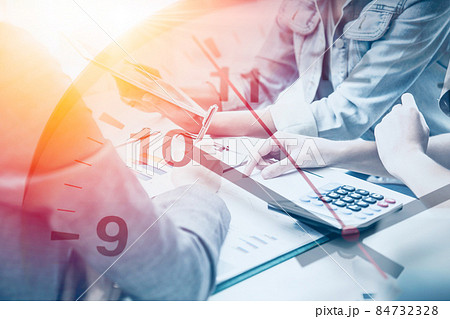 Business Working hours Concept, Office Employee Team Meeting Work Together overlay with Times Clock. 84732328
