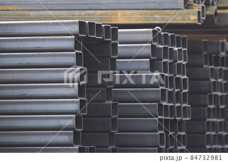 Metal profile pipe of rectangular cross section in packs at the warehouse of metal products Metal profile pipe of rectangular cross section in packs at the warehouse of metal products 84732981