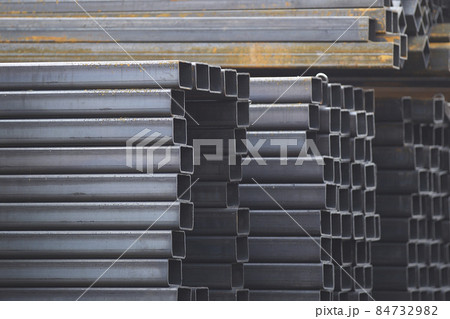 Metal profile pipe of rectangular cross section in packs at the warehouse of metal products Metal profile pipe of rectangular cross section in packs at the warehouse of metal products 84732982