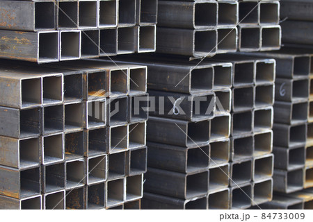 Metal profile pipe of rectangular cross section in packs at the warehouse of metal products Metal profile pipe of rectangular cross section in packs at the warehouse of metal products 84733009