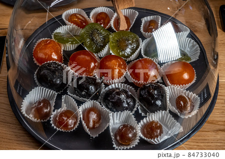 Close up of mixed dried and caramelized fruits on the shop. Close up of mixed dried and caramelized fruits on the shop. 84733040