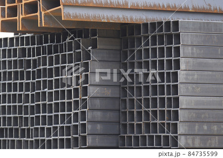 Metal profiles of different kinds are located in the metal products warehouse Metal profiles of different kinds are located in the metal products warehouse 84735599