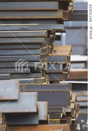 Metal profiles of different kinds are located in the metal products warehouse 84735629