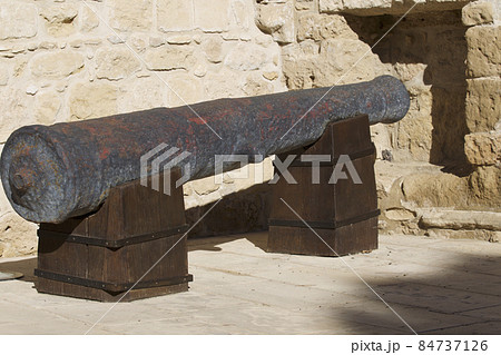 Ancient cannon weapon defense in an old fortress Ancient cannon weapon defense in an old fortress 84737126