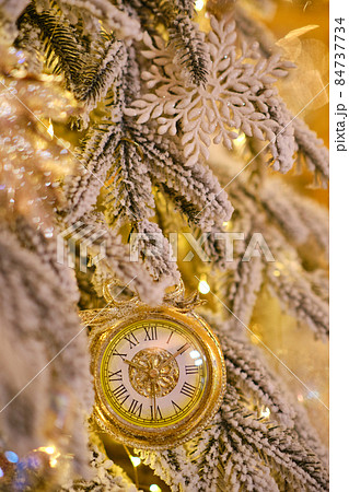 Close up of Christmas tree with white ornaments of baubles 84737734