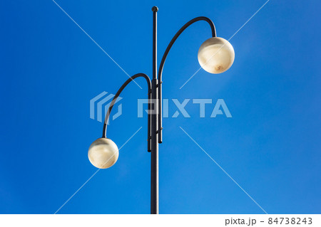 street lights on high steel pillars and sky 84738243