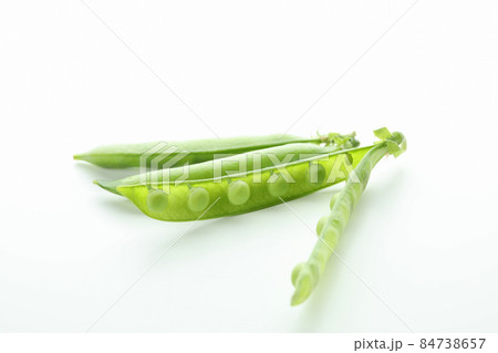 Tasty fresh green pea on white background Tasty fresh green pea on white background 84738657