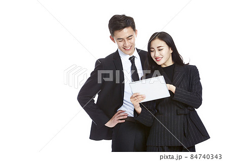 asian business man and woman using digital tablet asian business man and woman using digital tablet 84740343