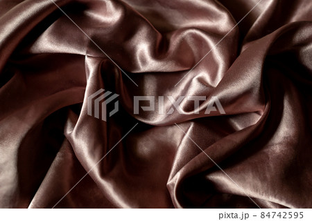 Pale pink color of crumpled silk fabric, textile background Pale pink color of crumpled silk fabric, textile background 84742595
