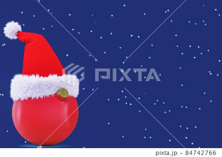 Santa Claus hat is worn on a New Year's, round toy on an evening background with snowflakes. 3D rendering 84742766