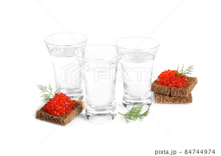Russian vodka and red caviar sandwiches isolated on white 84744974