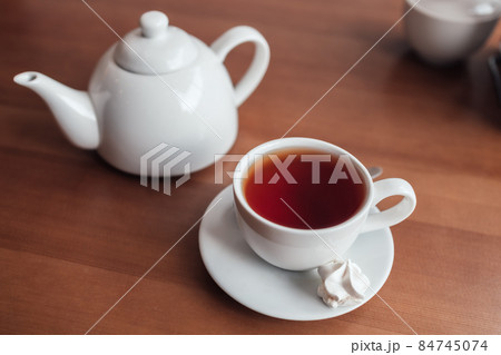 Hot tea in white cup 84745074