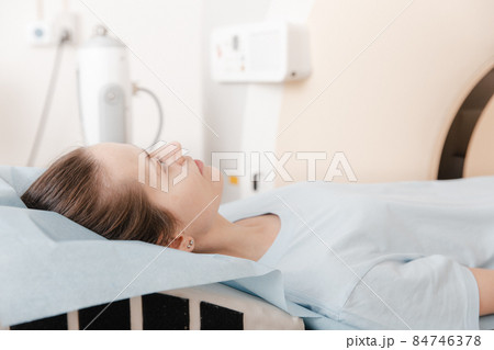 Medical CT or MRI Scan with a patient in the modern hospital laboratory. Interior of radiography department. Technologically advanced equipment in white room. Magnetic resonance diagnostics machine. 84746378