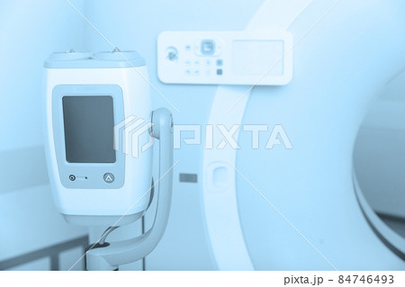Medical CT or MRI Scan in the modern hospital laboratory. Interior of radiography department. Technologically advanced equipment in white room. Magnetic resonance diagnostics machine. 84746493