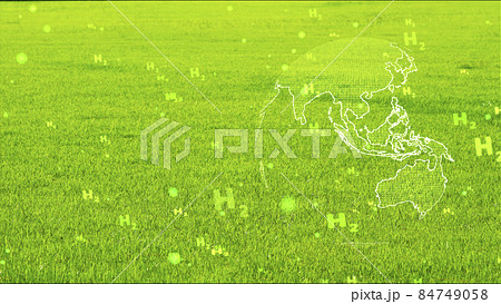 global digital and south east asia with green H2 text particles flying on green grass background 84749058