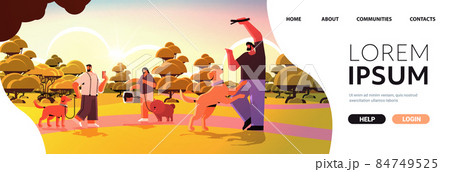 mix race people walking with dogs owners and cute domestic animals having fun friendship with pets concept 84749525