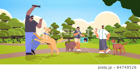 mix race people walking with dogs owners and cute domestic animals having fun friendship with pets concept mix race people walking with dogs owners and cute domestic animals having fun friendship with pets concept 84749526