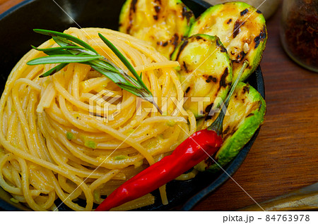 italian spaghetti pasta with zucchini sauce on iron skillet italian spaghetti pasta with zucchini sauce on iron skillet 84763978