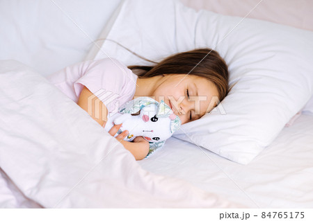 little girl with toy sleeping at home little girl with toy sleeping at home 84765175