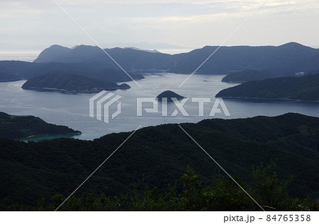 瀬戸内町の高知山中腹から大島海峡の俯瞰 瀬戸内町の高知山中腹から大島海峡の俯瞰 84765358
