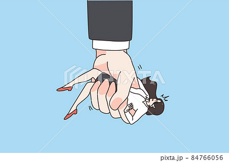 Huge man hand hold woman in clenched fist Huge man hand hold woman in clenched fist 84766056