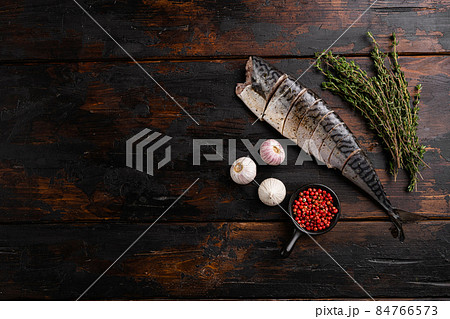 Delicious Braised Mackerel, on old dark wooden table background, top view flat lay, with copy space for text 84766573