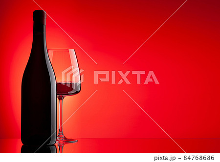 Red wine glass and bottle 84768686