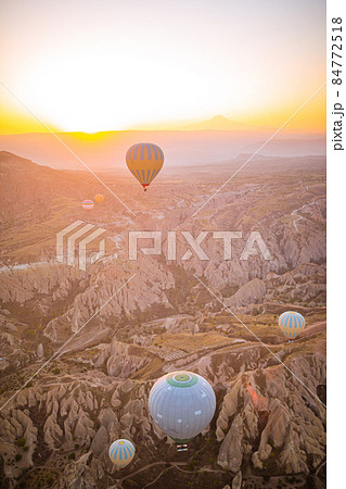Bright hot air balloons in sky of Cappadocia, Turkey Bright hot air balloons in sky of Cappadocia, Turkey 84772518
