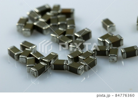 SMD ceramic capacitors on white background. Electronic components. SMD ceramic capacitors on white background. Electronic components. 84776360