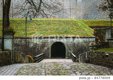 Kuressaare, Saaremaa Island, Estonia. Entrance To Episcopal Castle. Traditional Medieval Architecture, Famous Attraction Landmark Kuressaare, Saaremaa Island, Estonia. Entrance To Episcopal Castle. Traditional Medieval Architecture, Famous Attraction Landmark 84778009