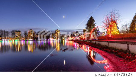 Trail in a park around Lafarge Lake with Christmas Lights. Trail in a park around Lafarge Lake with Christmas Lights. 84778327