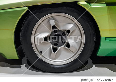 Wheel of a conceptual green sports car 84778967